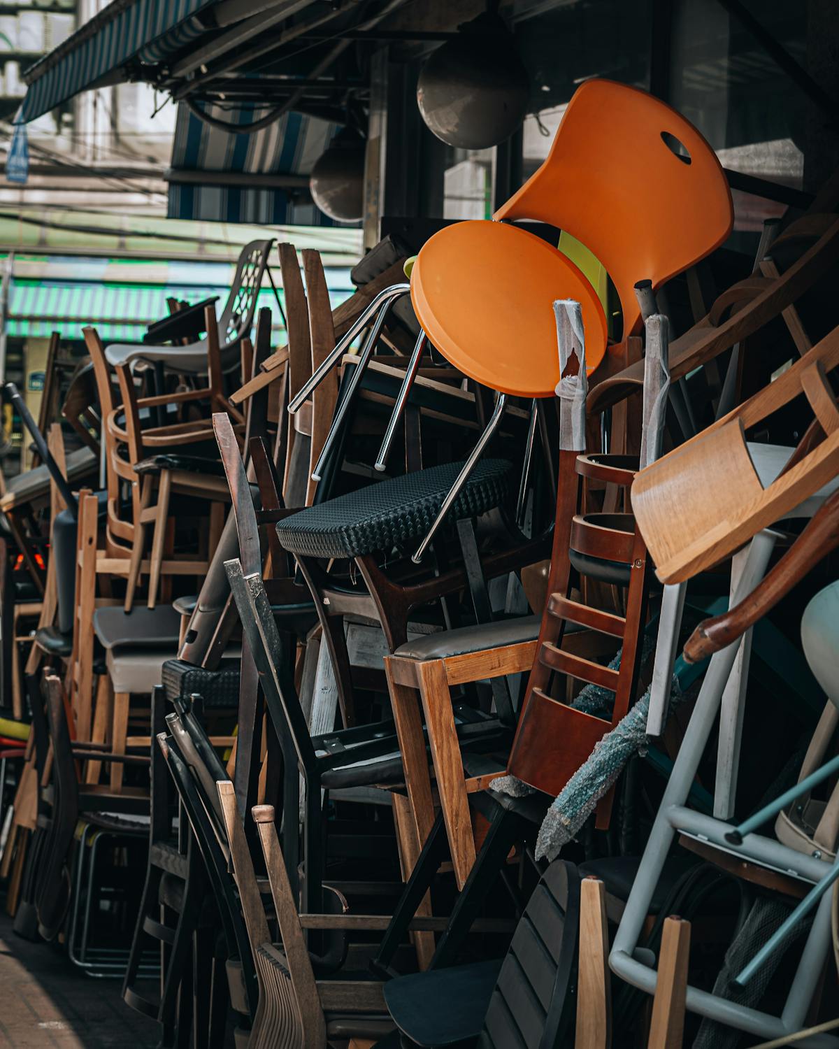 Japan surplus furniture shop with stacked chairs